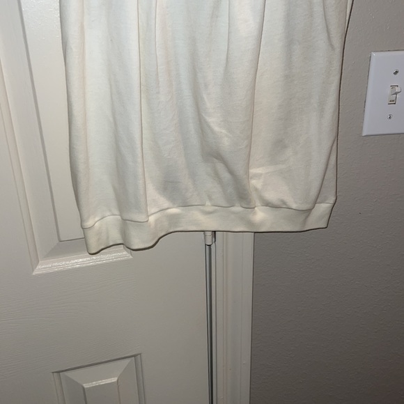 Ivory colored top with decorative neckline - Picture 4 of 8